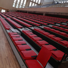 Red Foldable Q235 Steel Retractable Seating System / Telescoping Bleachers